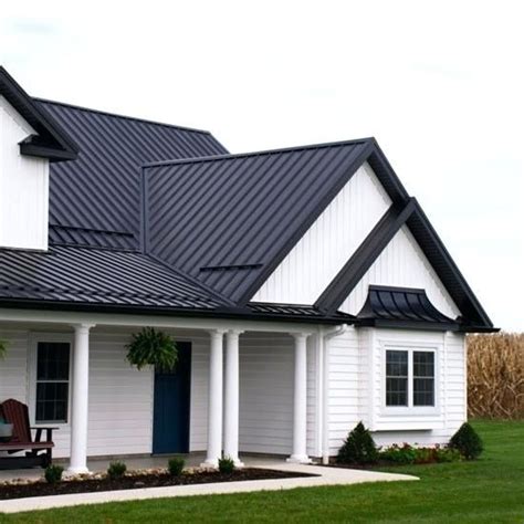 white house metal roof color|house with black metal roof.